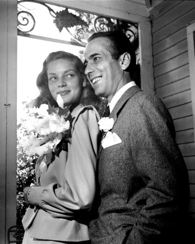 Unknown Photographer - Lauren Bacall and Humphrey Bogart on their wedding day, Ohio, 1945